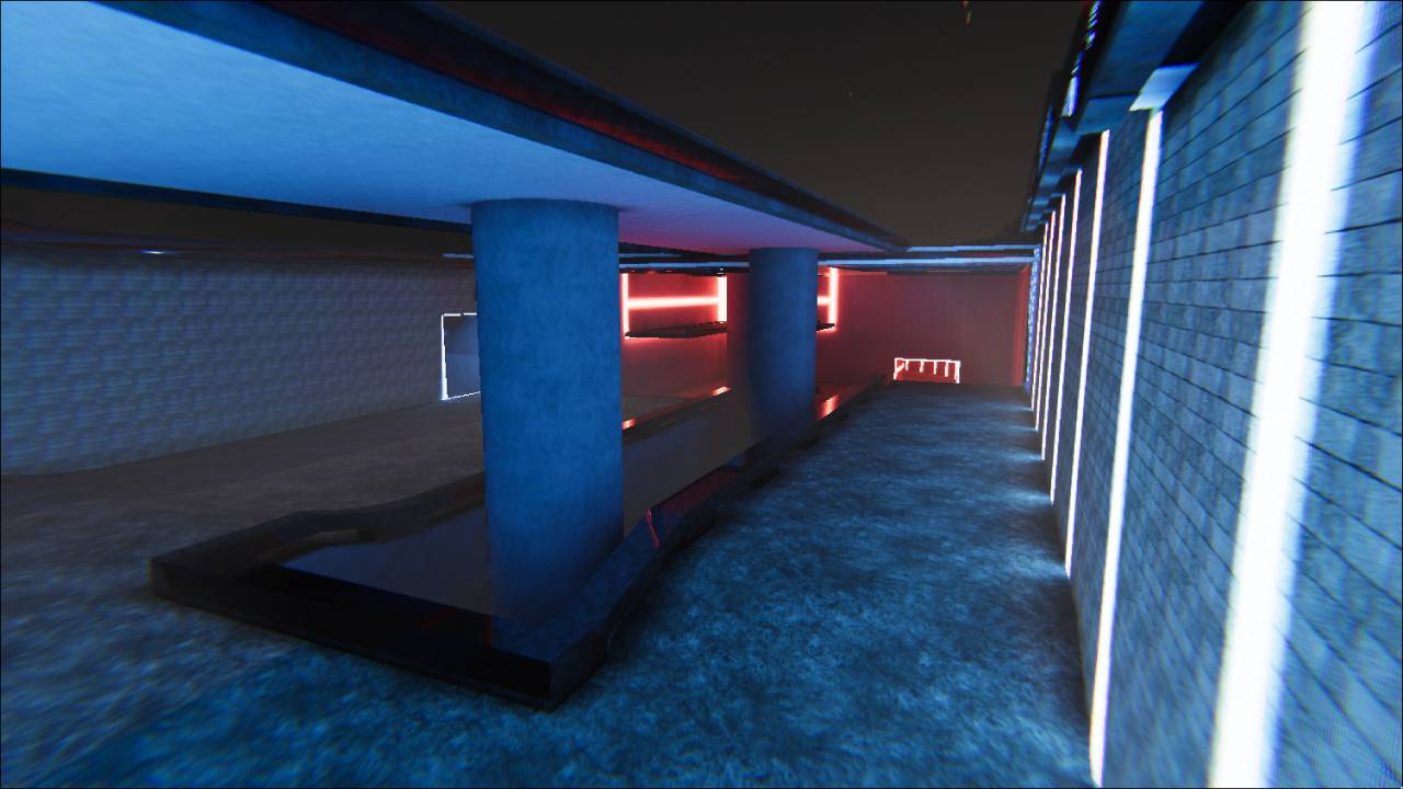 Elevated view over the arena with pillars, walkways and strong red-blue contrast lighting.